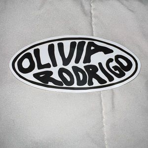Olivia Rodrigo official merch sticker included in sour album